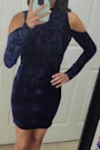 Lovely thick, velvet material. Great quality. Hugs my curves in all the right places! The length falls a couple inches above my knees. - Jessy C.