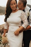 This dress was so beautiful, I wore it for our wedding elopement pictures, it fits like a glove and the back was so beautiful. I bought a belt to top it off and it was stunning! - Emily C.