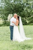 This dress is amazing! I overnighted it after having to postpone my wedding (2x) and have a micro wedding. I'm usually in between a 2 and a 4, depending on where I shop. It fit perfect! The straps are not adjustable, but that wasn't an issue for me. - Amanda J.