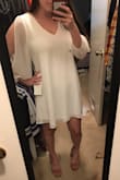 I ordered this for my bridal shower, and I'm so happy with it! I tend to like things looser, and normally would order a Medium. I saw other reviews saying to size down, so I originally ordered a Small. Even that was a little too big, so I returned and got an XS. I absolutely love it! - Corrie M.