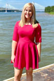 Thick material, cute neck pattern, and shows off my legs. The color is vibrant too! - Amber H.