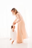 Literally could not have dreamed of a better dress for my Mommy&Me pictures. Usually when you get a dress like this, it is stunning but impossible to move in. This dress was so comfortable and I was fully able to bend over/chase my 2 year old around. 20/10 - Logan J.