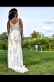 This dress exceeded my expectations. Our destination wedding was canceled because of COViD and we planned a backyard wedding in two weeks. I felt absolutely stunning in this dress. - Dominique V.