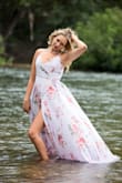 I ordered this wrap maxi dress (along with the Gardening Meandering Lavender Floral wrap maxi as well) for a photoshoot for my daughters. The dresses arrived on time (2 day priority!), the fabric and cut were quality, and fit perfectly. The bodice snap helped hold everything together up top, while the slit showed just the right amount of leg peeking through. The fabric flowed wonderfully. - Valerie M.