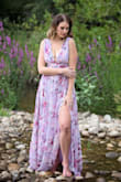 I ordered this wrap maxi dress (along with the Elegantly Inclined Lavender Floral wrap maxi as well) for a photoshoot for my daughters. The dresses arrived on time (2 day priority!), the fabric and cut were quality, and fit perfectly. We used tape rather than a bra to hold things together up top, while the slit showed just the right amount of leg peeking through. The fabric flowed wonderfully. - Valerie M.