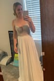 Gorgeous dress!! Just a little too much beading and bling for my liking. I ended up returning it for a more simple style for our mountain elopement, however, if you like the extra dazzle, but still simple this is your dress! - Jenny L.