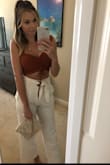 These pants are to die for. They are so cute and so easy to dress up or down. I normally wear a 26-inch waist, and I ordered a 25 by accident, and they fit great! I probably could've gotten the 26, and they would have fit great as well with the front tie. - Sydney S.