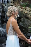 I wore this dress for our "covid" elopement and could not be happier! It fit perfect and I didn't have to have one single thing altered! Ordered a size 2 for reference. - Taylor T.