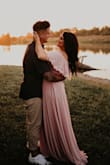 This dress fit perfectly. I loved everything about it. The quality was incredible and it fit like a glove, so flattering. The one thing I will say was a downfall for me was the length. It was long for me, even with heels on. All I can say is BUY THIS DRESS. Our engagement photos turned out beautifully thanks to this dream of a dress - Hillary B.