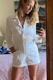 I love it! The little buttons on the side cinch perfectly at the small of your waste. I'm pretty tall and a small fits really well so I would go down a size. - Alexandra B.