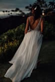 This dress is gorgeous, I got a lot of compliments.
It runs a little larger so I ordered size 2 instead of 6.
I also had to take my dress to a tailor to shorten the length. - Ana G.