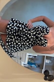 so I'm keeping it because it is super cute but I definitely felt super self conscious in this. Between thinking my boobs would fall out or if i bent over my booty was right there, lol. But if you're standing and mingling, it's typically good. Got so many compliments ! - Linsey M.