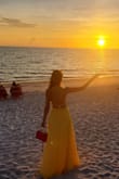 Just a beautiful yellow dress! The color and the way that it fits it's amazing! Loved it! - Mirelys P.