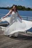 We moved our wedding day, but decided to still honor the date.  This was the perfect dress for the occasion. Dress was a tad large and extra long, but still worked perfectly.  I had a ton of fun taking pictures in the dress. - Emily D.