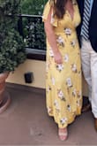 I loved this dress! It was super long even for me at 5'6" with heels on. I had to get it hemmed prior to wearing it so plan for that if you are in a time crunch. The wrap was perfect because it fit to my body type- you could make it as tight or as loose as you wanted. Will definitely try to find an excuse to wear this dress again - Erin E.