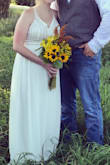 Absolutely love this dress. It was long for me, but my grandmother was able to shorten it. I'm 7 months pregnant and wore it for our small farm wedding...it was perfect! - Ariel T.