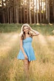 This dress was perfect for my Senior pictures. It fit true to size and was very comfortable to wear. The material had some stretch and held up to posing without wrinkling. I would recommend this dress if you are looking for something classic and comfortable. - Candace C.