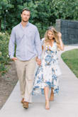 I bought this dress for engagement photos and I loved it. It photographs so well and is perfect for twirling pictures lol. I did have to get the dress hemmed which I excepted since I'm short. The neckline is very low-cut so I altered that as well- I did feel slightly constricted in the chest area but I was kind of expecting that was well with my chest size. I would definitely recommend this dress, just know that if you have a similar body type to me you will likely need to get it altered. - Ellie K.