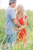 Wore this dress for engagement pics & I loved the pop of color! I probably should have ordered a large but it's a wrap dress so it worked. - Sarah C.
