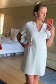I love this dress. It fit perfectly, loose fit with a sexy v neck.  I find that it is not too short on me and the material is a little thicker and solid, so it is not see-through. I cannot WAIT to wear this! In love! - Jessica M.