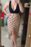 I ordered this skirt on a whim, not really sure how much I would actually like it in person. I liked it a lot on the model and couldn't stop thinking about it. It was part of the outlet sale, so I figured why not branch out and try something new? I absolutely LOVE this skirt. I think it's so fun and unique. I ordered a size M and it fits a little snug around my hips, probably due to the quarantine weight gain. It's not uncomfortable, but it does pull the lining on the front wrap of the skirt a little bit. - Cassidy E.