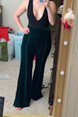 I absolutely LOVE these pants! I ordered a size Large since that was the only size left, but I do think I could've gotten away with a Medium if they had been in stock. These are like comfy, chic, fancy sweatpants and I adore them. I am wearing ~3 inch heels in the photo, so I will definitely need to get them hemmed because they're so long, but I don't even mind! I can't wait to wear these around the holidays. One of my favorite purchases ever! - Cassidy E.