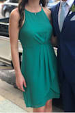 Beautiful color! While it is called teal green, I felt like the pictures were more of a Kelly green, but it really is on the teal side. I was maybe worried about needing a medium based off reviews, but it was perfect (usually 4, sometimes size 6), and even a little extra room in the bust, waist, and hips, but not too much. My only complaint is the arms holes are a little too low. I felt like it was a struggle between keeping my bra low enough not to show, but high enough for support... ugh, strapless bras!! Overall beautiful dress and I got lots of compliments! - Brooklyn S.