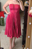 I like this dress a lot! It fit well and I liked that even though I had on a strapless bra, I couldn't see it through the mesh in the middle of the bodice unless I was really looking hard. It's a little wrinkly on the bottom aside from the pleats, so I need to steam it for sure! - Cassidy E.