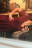 Loved this dress, it was exactly what I was looking for. I couldn't decide if I wanted to order a medium or a large but ended with a large. It was a little big on me so I sewed about an inch and a half back around the waist and it was great. Should have gotten a size smaller. I got lots of compliments on the dress at the wedding. Was fairly low cut for me though. - Alex O.