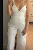 Love this jumpsuit for my beach wedding! It's the perfect length. At first I was concerned about the top being too big but once I adjusted the interlacing strings in the back it fit perfectly! - Caroline A.