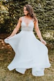 I ended up ordering this beauty 2 weeks prior to getting married - we swapped our 200 person wedding for an intimate beach ceremony and my original dress was not altered yet (after postponing twice). This dress was absolutely stunning - I ended up getting it hemmed about 2-3 inches but overall PERFECT :) - Taryn G.