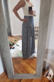 Great skirt can dress up or down, I just wish the zipper on the side didn't make it bulge out a bit more on my hip. - Sarah D.