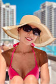 I love this straw hat. Very stylish for the infinity pool in my high rise!! - Holly N.