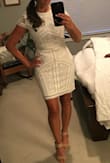 This dress is gorgeous in person! It has both lace and sequin details. It is definitely form fitting, but it fits true to size. I'll be wearing it for various pre-wedding events! - Amy G.
