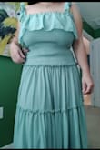 I was skeptical to order this dress because there was no reviews but decided to take a chance. The things I liked about the dress was the colour is gorgeous, straps are adjustable and that the dress isn't remotely see through. BUT I normally go between a medium or large in Lulus dresses. So I ordered a medium in this dress, however it's totally massive and makes me look bigger than I am. It's hard to tell from the pictures but the fabric doesn't hug my body at all and actually bunches up with all the extra material. Also be prepared the dress looks light weight but it's very heavy. Also hits the floor not my ankles which I would have liked better. Will definitely exchange for a smaller size. - Melissa M.