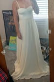 I cannot wait to wear this amazing dress! After trying on numerous dresses, this was the perfect one! Just the right amount of movement and simplicity! - Jenny L.