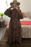 I bought this dress for a lake side country chic wedding. It is very feminine and pretty. It runs a little big, but that is the look of the dress. It flows beautifully and is so comfortable. I love the sleeves and the lace trim. - Michele B.