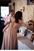 Beautiful dress, elegant and classy. Wore this for my daughters 1st birthday party and recieved so many compliments. The only negative thing I would say is the dress was super long so I had to get it hemmed. - Melissa H.