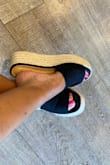 I saw a friend wearing a pair and had to have them. She gave me the site and I absolutely love them. I'm in between a size 7 and 7.5, in some shoes. I got a size 7.5 because the 7 were sold out and they fit great. They are super affordable and comfortable. Great for summer time. - Joanna R.