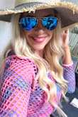 Used this hat for a photo shoot. It's very flattering and is easily moldable to shape the way you want. The blue adds a nice complimenting touch! Loved it!! - Samantha D.