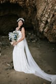 I absolutely loved this dress for my small beach ceremony! The details are amazing and no one could believe the price. The only thing I would say is it runs a little long, I'm 5'4" and ordered a size small and I needed high heels in order to walk in it! - Kelsey B.