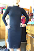 Its comfy and easy to move in. The fabric stretches a little, making it comfortable to maneuver in. Color is good (matching the model photo pretty well). Fabric is soft, not unbearably scratchy on the skin. Beautiful dress good for fall, winter, and spring temps. Fits well too. Very nice! - Kortney B.