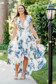 Due to the pandemic, we had to postpone our wedding but decided to legally get married on our original wedding date. I didn't want to wear my wedding dress for this ceremony so I ordered this dress. It was absolutely perfect. I was in love with the style, the colors, and the quality of the material. Every one who saw photos complimented the dress. I definitely will keep this as a go to dress for certain occasions. It made the day all the more beautiful - Rachel T.