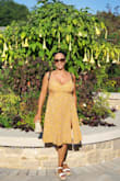 One of my favorite Lulus dresses because it's so versatile. I've dressed it up and down. Material is light and breathable. Easy to pack away for trips. Does shrink easily if too warm in the dryer. Air fluff or air dry. Will stretch a little with wear. - Heather J.