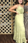 The dress was heavy. The top sat weird (but probably because I don't have a chest). I recommend to tie the waist string tight or no shape to your body will occur. - Emma B.