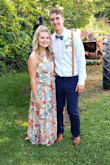 Wore this dress with 3-inch wedges and it worked perfectly for my event. Many compliments and very comfortable and airy. Highly recommend! Also has the high neck so you don't have to worry about your upper body being revealed while dancing! Perfect dress. - Kathleen R.