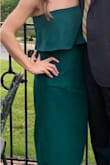 Absolutely love ordered XS, fit perfect but with enough room to where it wasn't too tight. The area has a sticky portion that allows the dress to not slide around the bust. - Allison S.