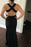 The criss-cross at the back is super uncomfortable as it doesn't fit right (too high up on the back & rubs against my armpits).
The dress is a thick heavy material & is really long, I will have to get it hemmed at least 6 inches. If this wasn't on final sale, I would have sent it back. - Agnes L.