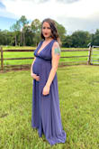 Such a flattering dress! I'm currently pregnant and usually a medium or small so originally I ordered a large to account for the bump. That size actually ended up being too big and I exchanged it for a medium. While the waist on the medium is a bit snug I know it'll fit perfectly once I'm not pregnant and I was still able to wear it for a wedding I attended last weekend. I will probably wear it again for my maternity shoot if I can zip it, haha. Highly recommend the dress in any color! - Ilana S.