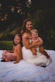 I wore this dress to a nursing photo shoot and it was stunning! My only complaint is the beads easily fell off and by the end of the shoot I was missing rows of them. - Shawna S.